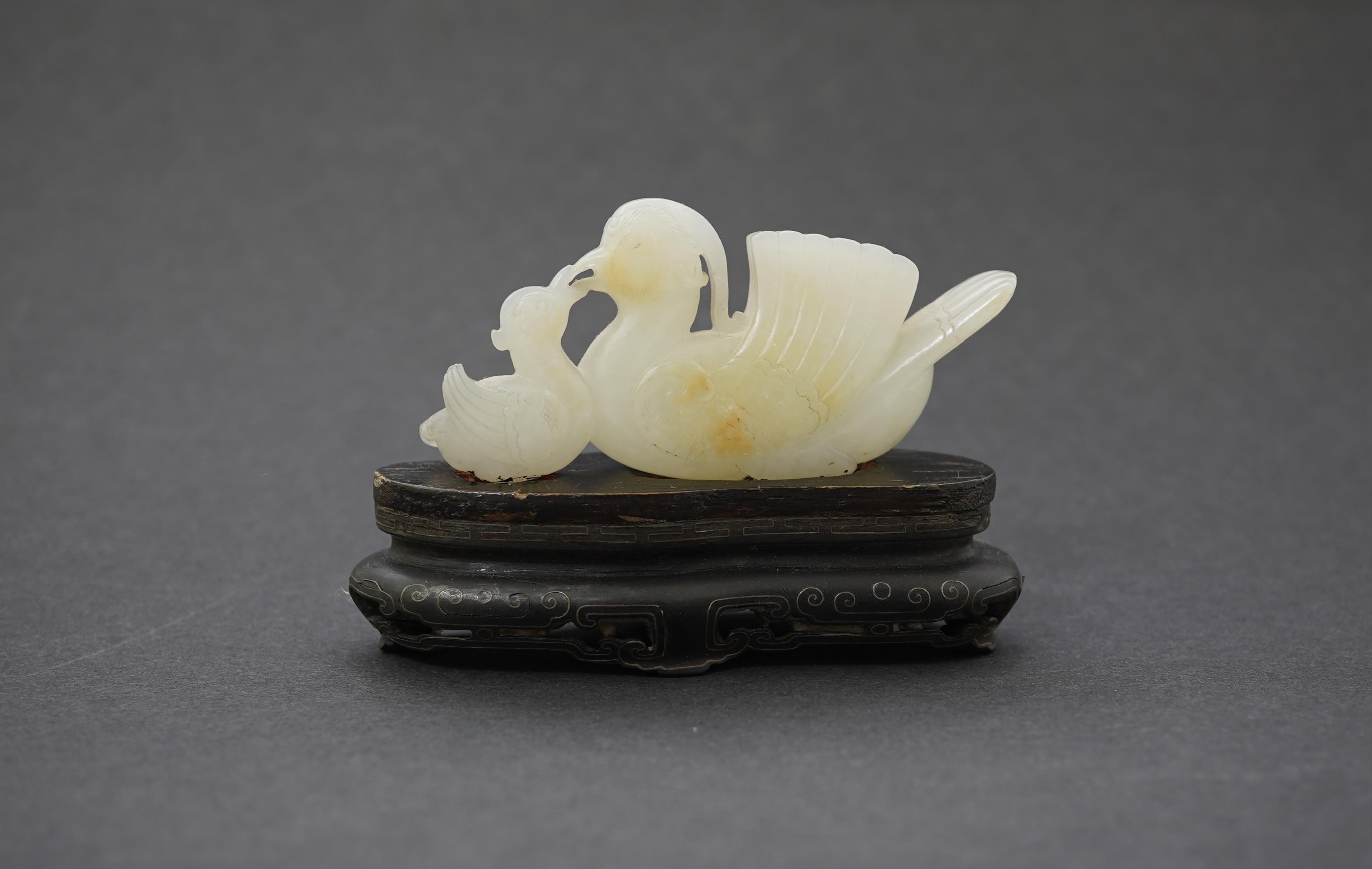 A Chinese white jade mandarin duck group, 18th/19th century